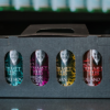 A box set of Raymonds Rubs sits on a counter top with a blurrred background.